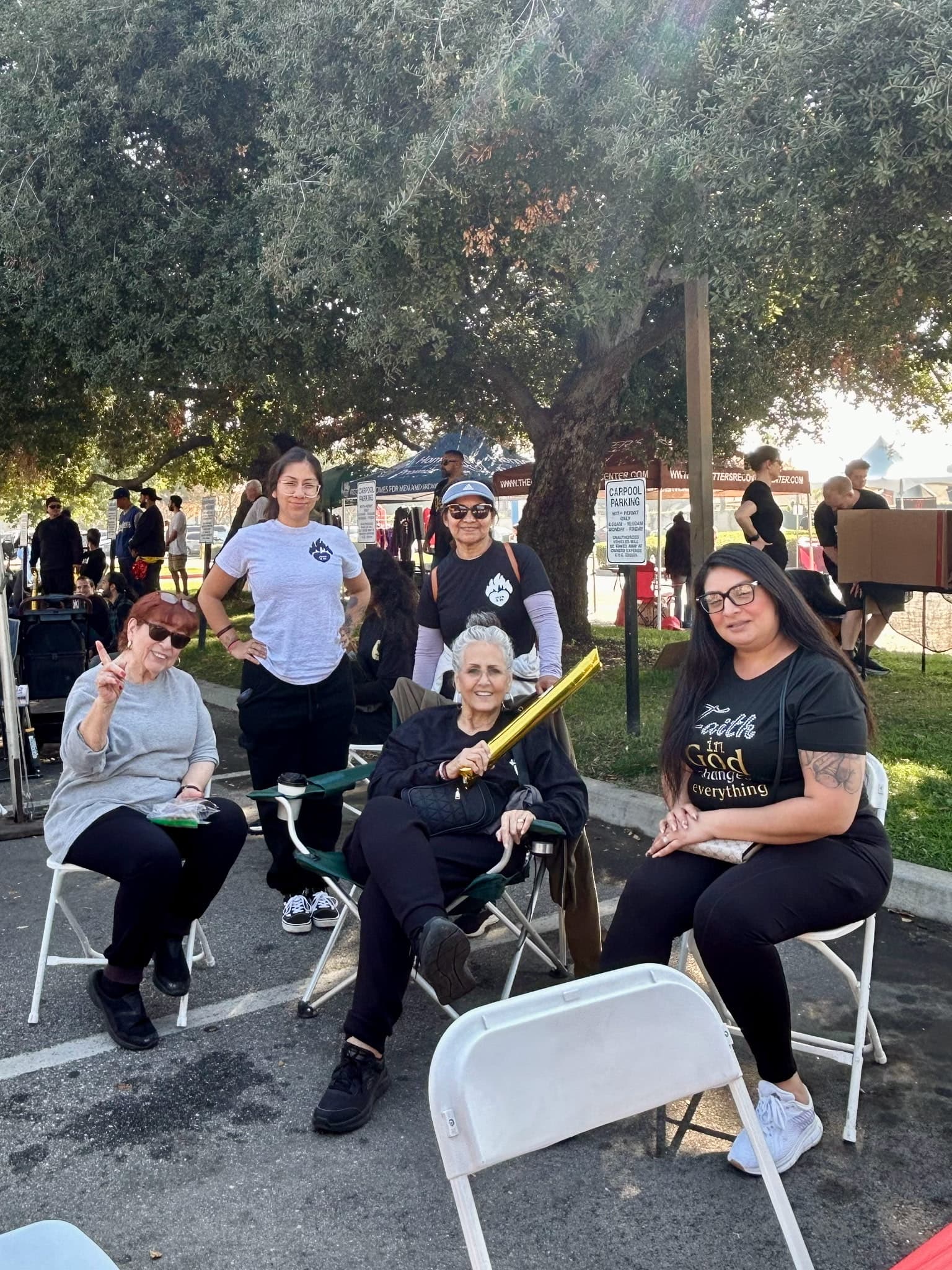 Group of five women at outdoor event